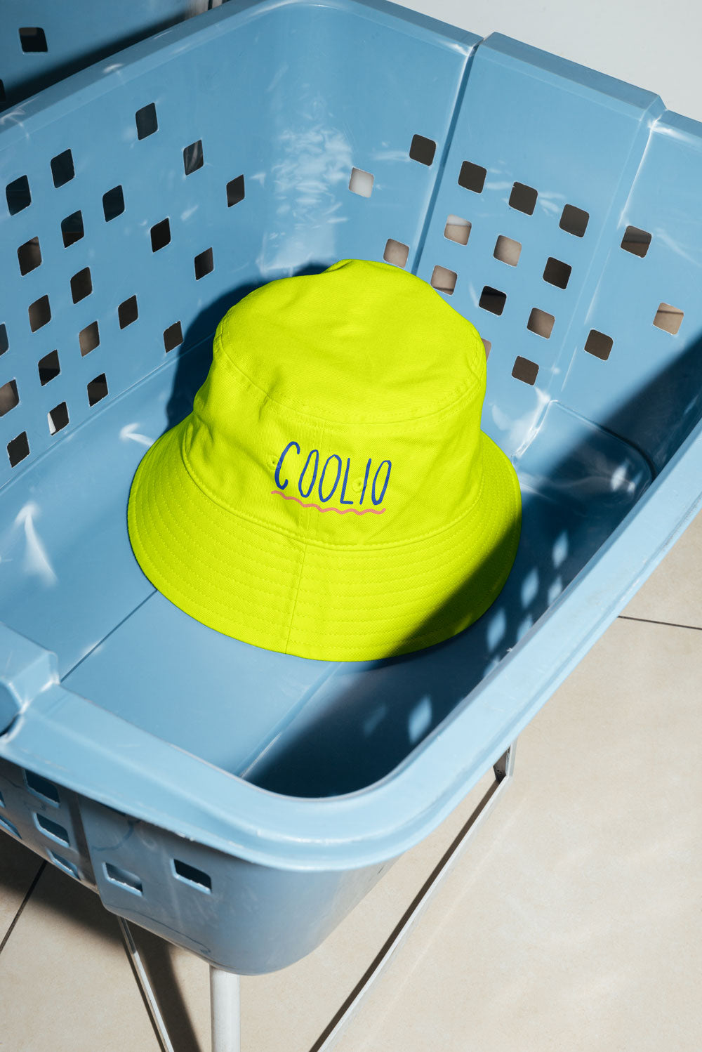 Bright neon citrus colour bucket hat with DTF transfer printed on it