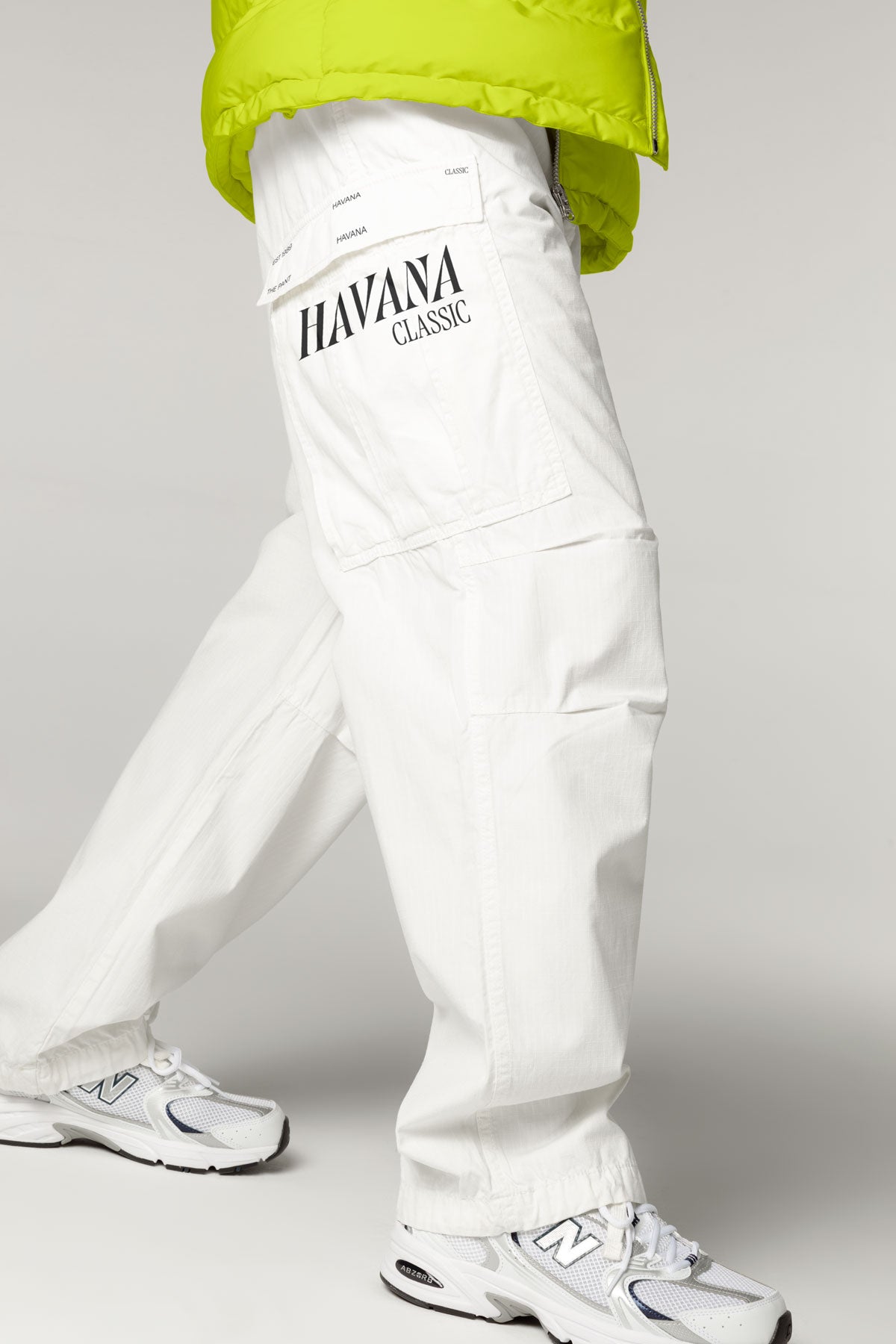 White pants with a custom logo printed on it